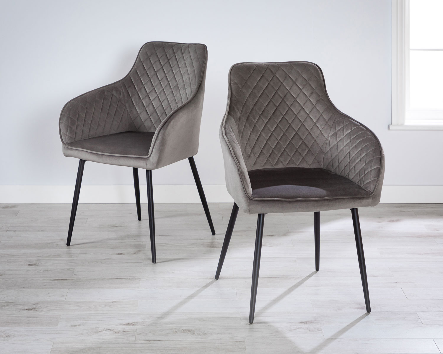 Product photograph of Pair Of Grey Velvet Carver Dining Chairs With Black Legs - Hampton from Lifestyle Furniture