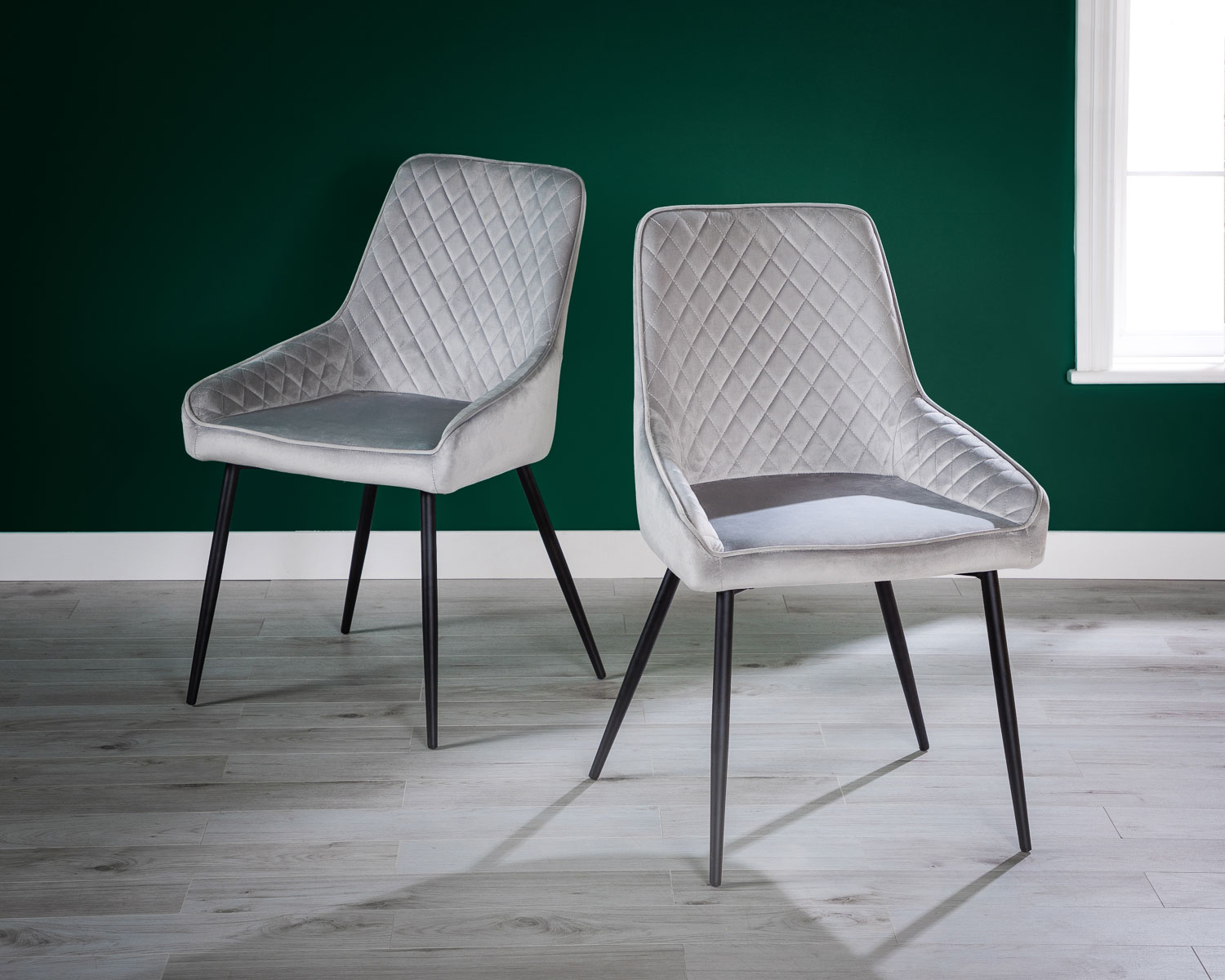 Product photograph of Pair Of Light Grey Velvet Dining Chairs With Black Legs - Hampton from Lifestyle Furniture.